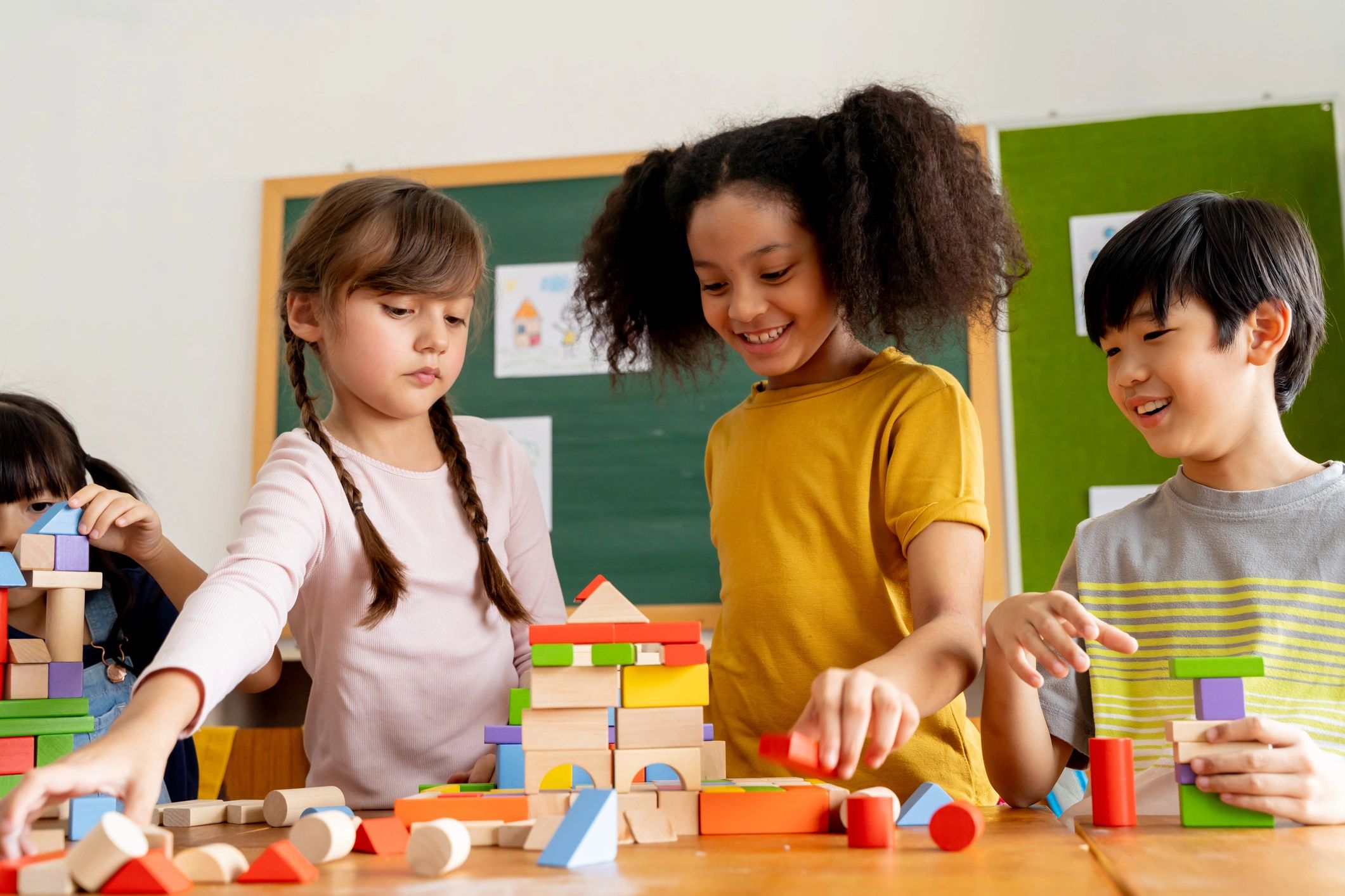 Children playing together in a classroom setting