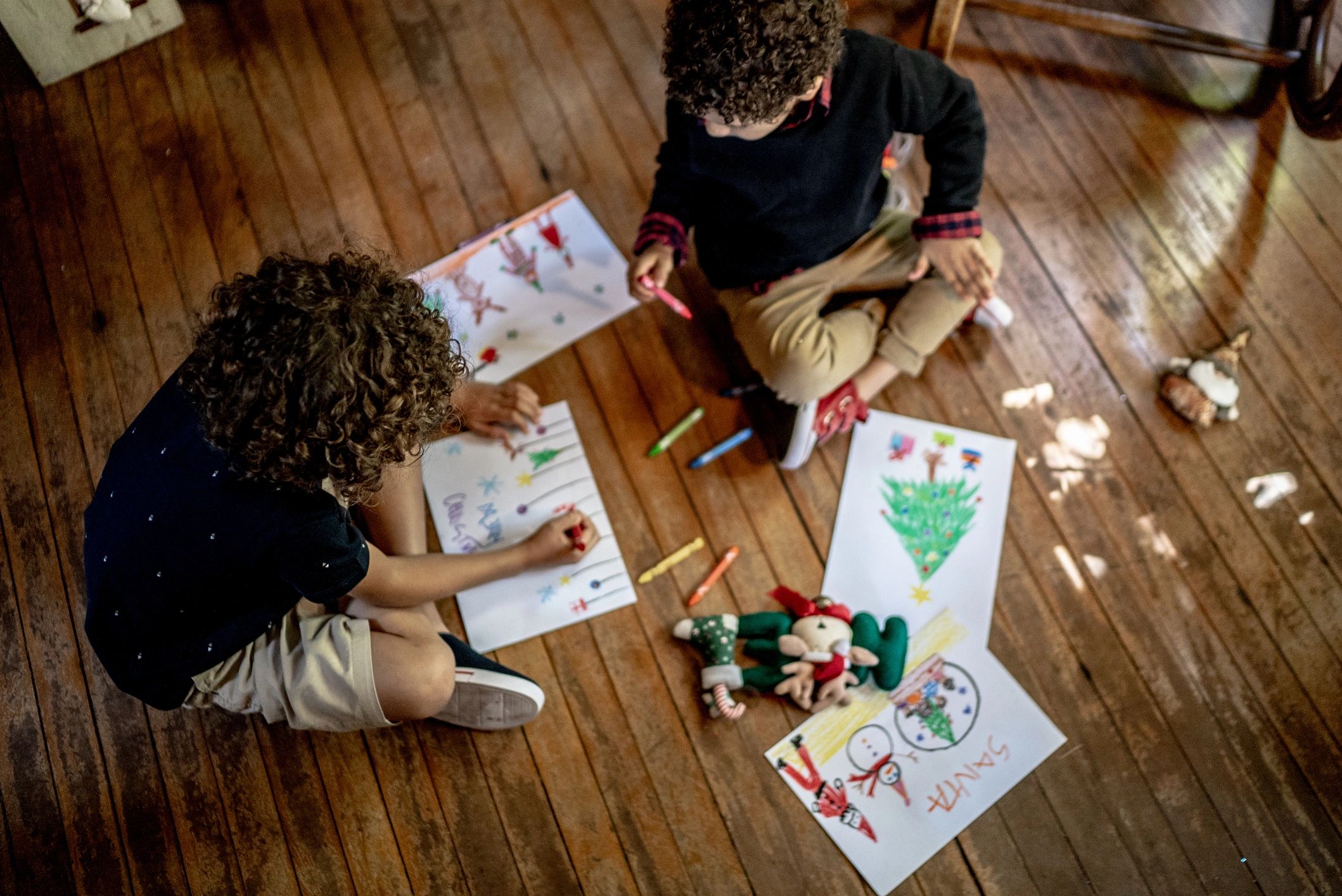 Kids drawing together at home
