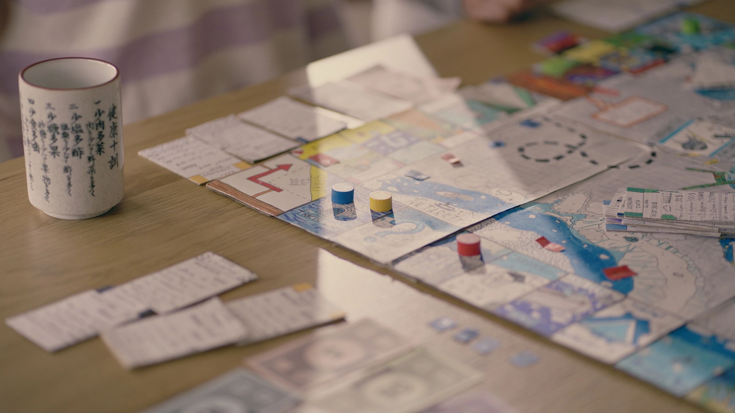 Board game set on a table, ready to play.