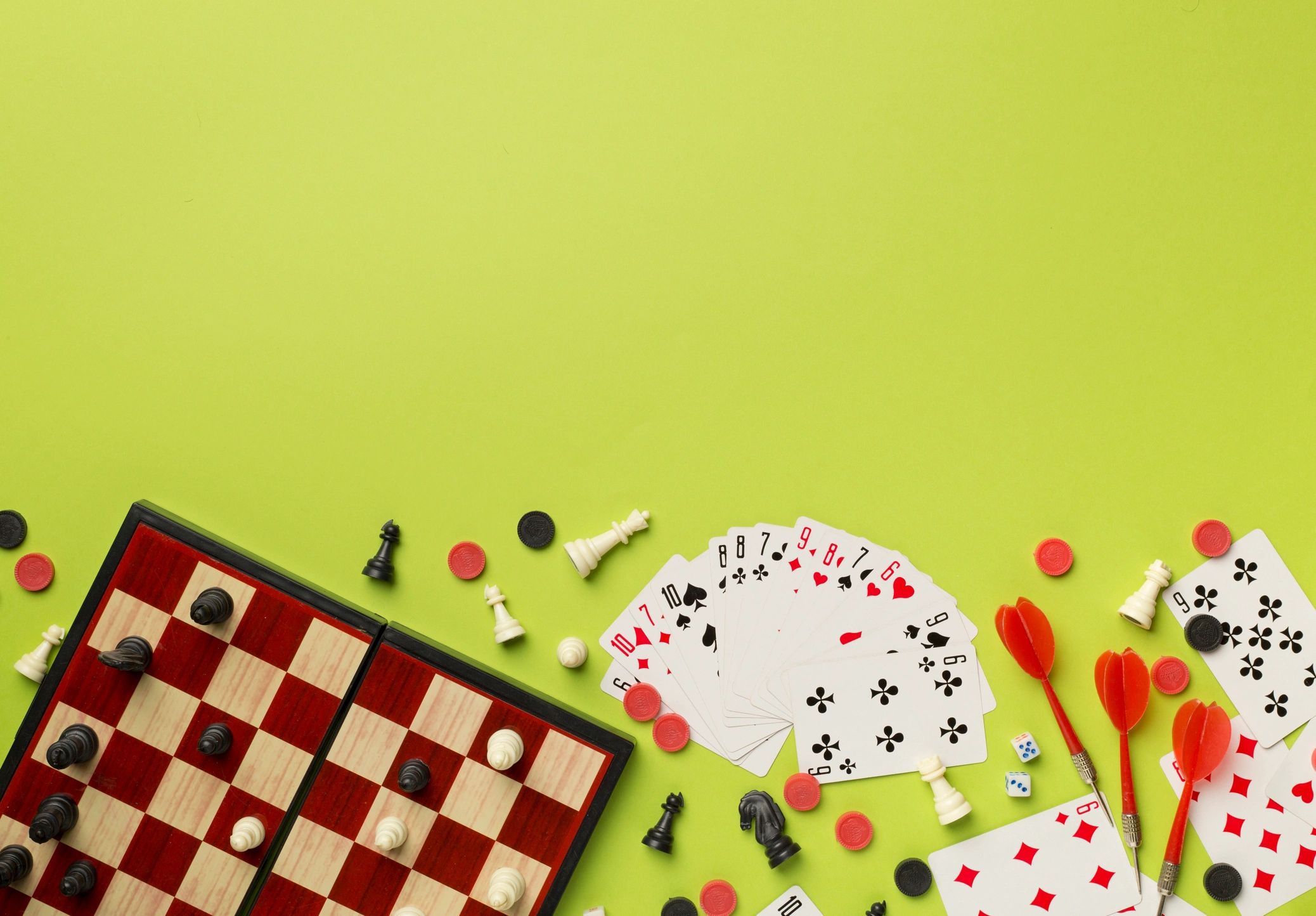 Assorted board games arranged on a colorful background.