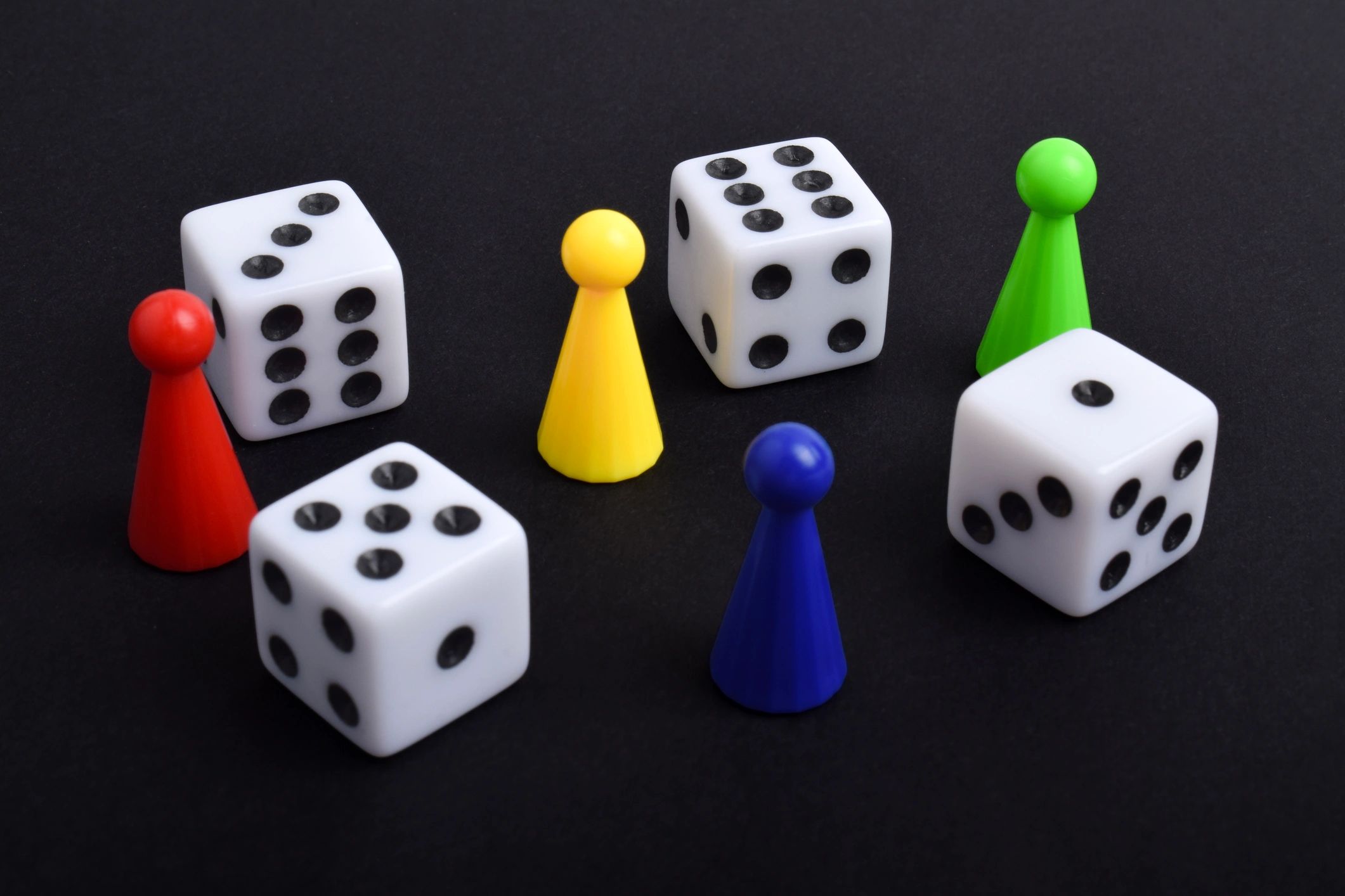 Colorful board game pieces and dice